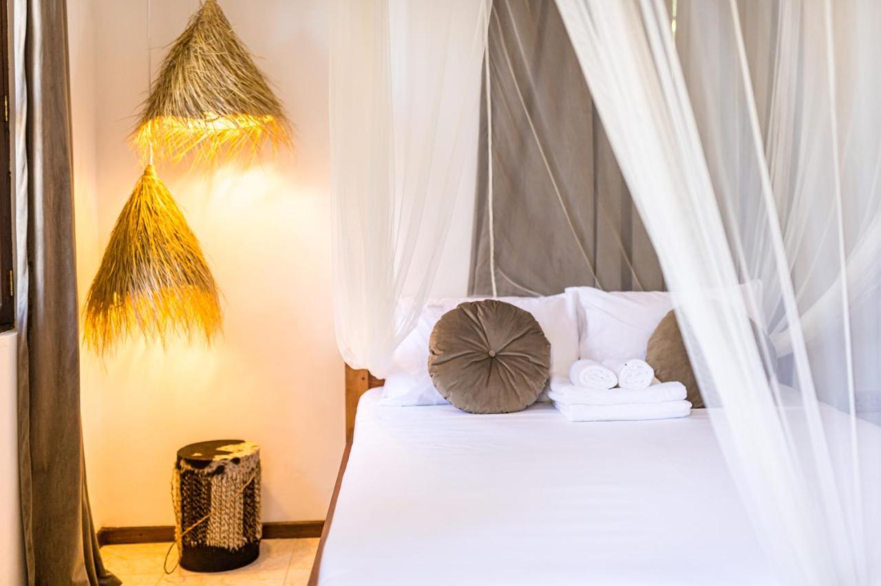 Kima Serviced Beach House & Suites Bwejuu Buitenkant foto