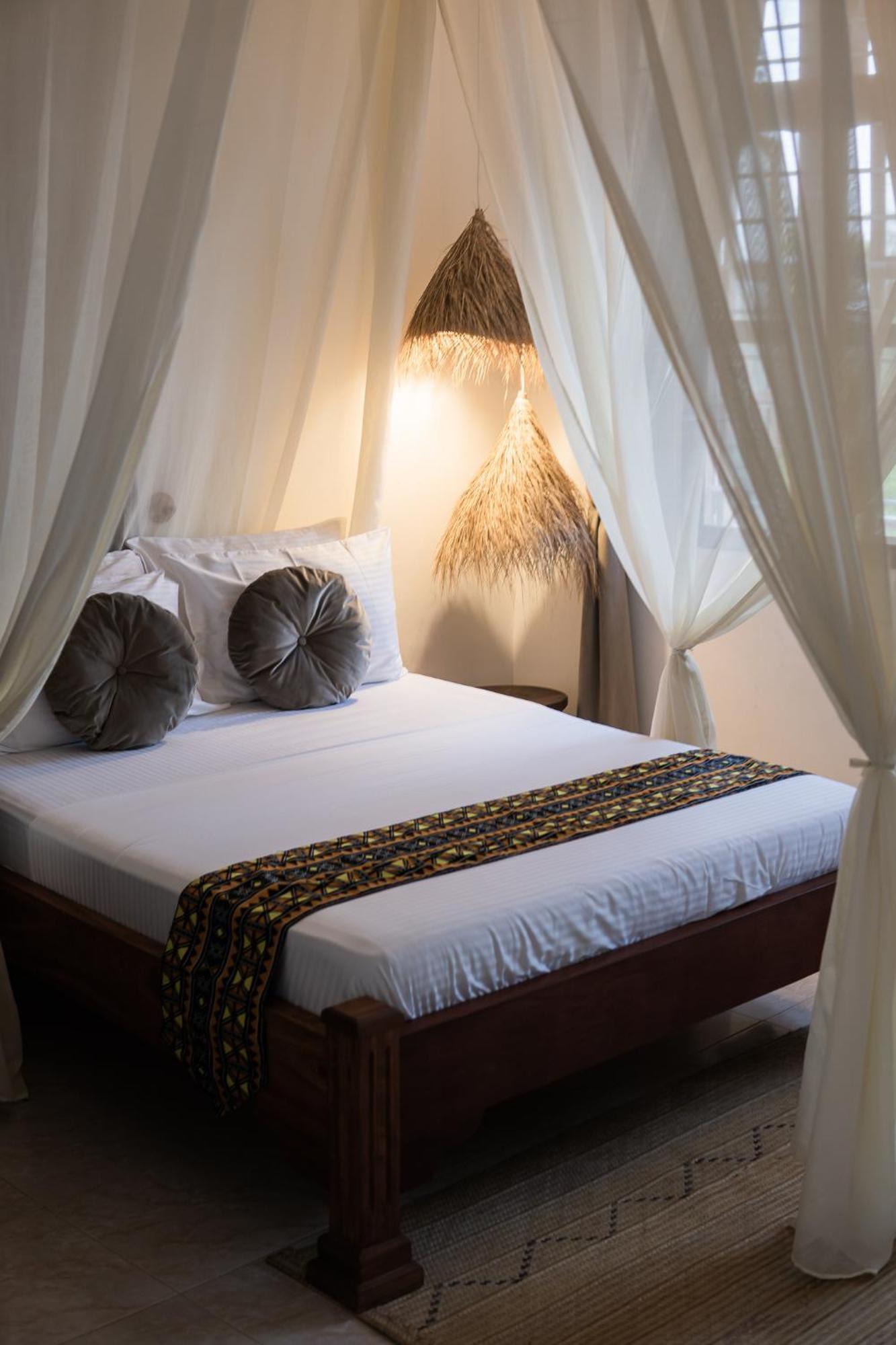 Kima Serviced Beach House & Suites Bwejuu Buitenkant foto